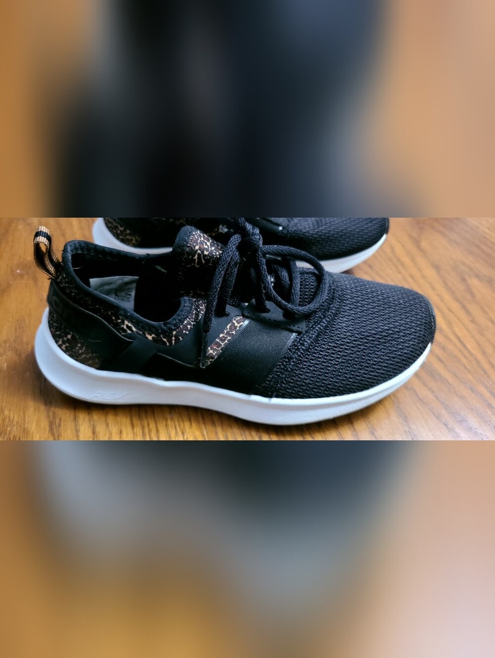 New Balance Black Sneakers with Tan Leopard Accent
